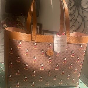 Gucci NWT BEAUTIFUL DISNEY TOTE. WITH ORIGINAL BOX/BEAUTIFUL RED SLEEPER BAG